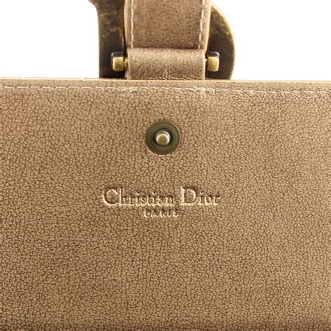 pochette bronzo dior